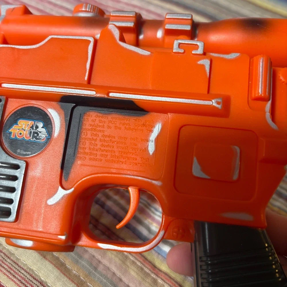 Disney Star Tours Star Wars Han Solo DL-44 Blaster Toy Orange Silver Weathered